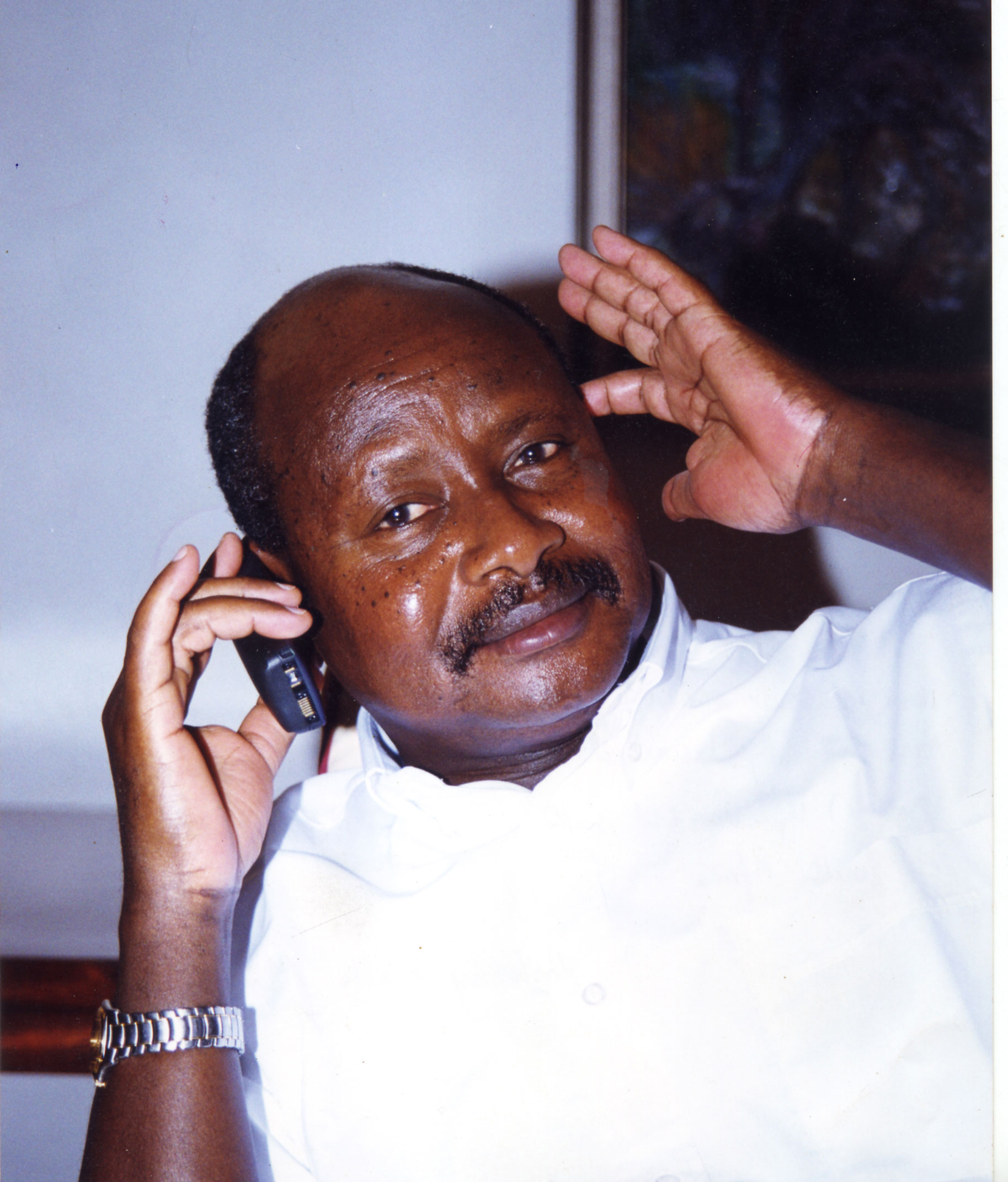 President Museveni officially launching the Mobile Telecom Network (MTN) Uganda with a call to former South African president Nelson Mandela on October 23, 1998