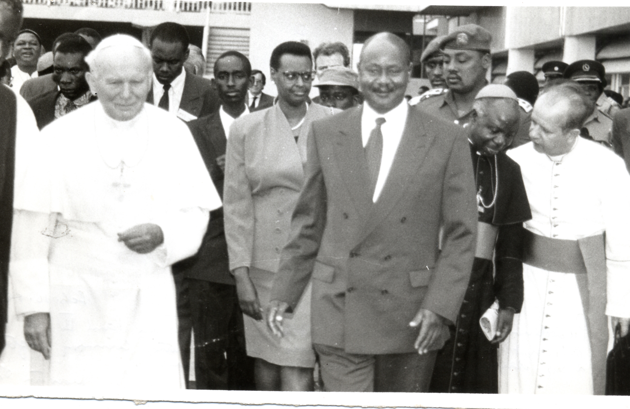The Pope was received by President Yoweri Museveni at Entebbe International Airport, where he famously kissed the ground.