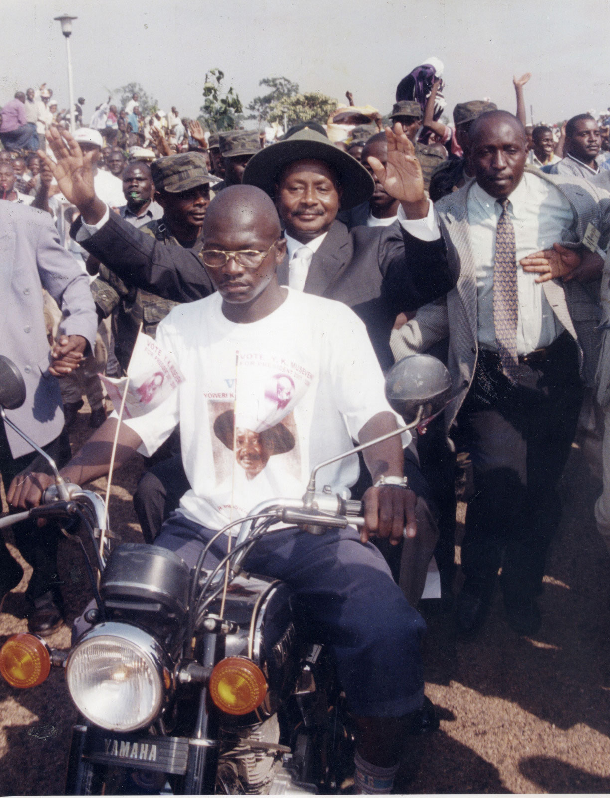 Museveni arrives on a boda boda for his nomination at Kololo in Jan 2001