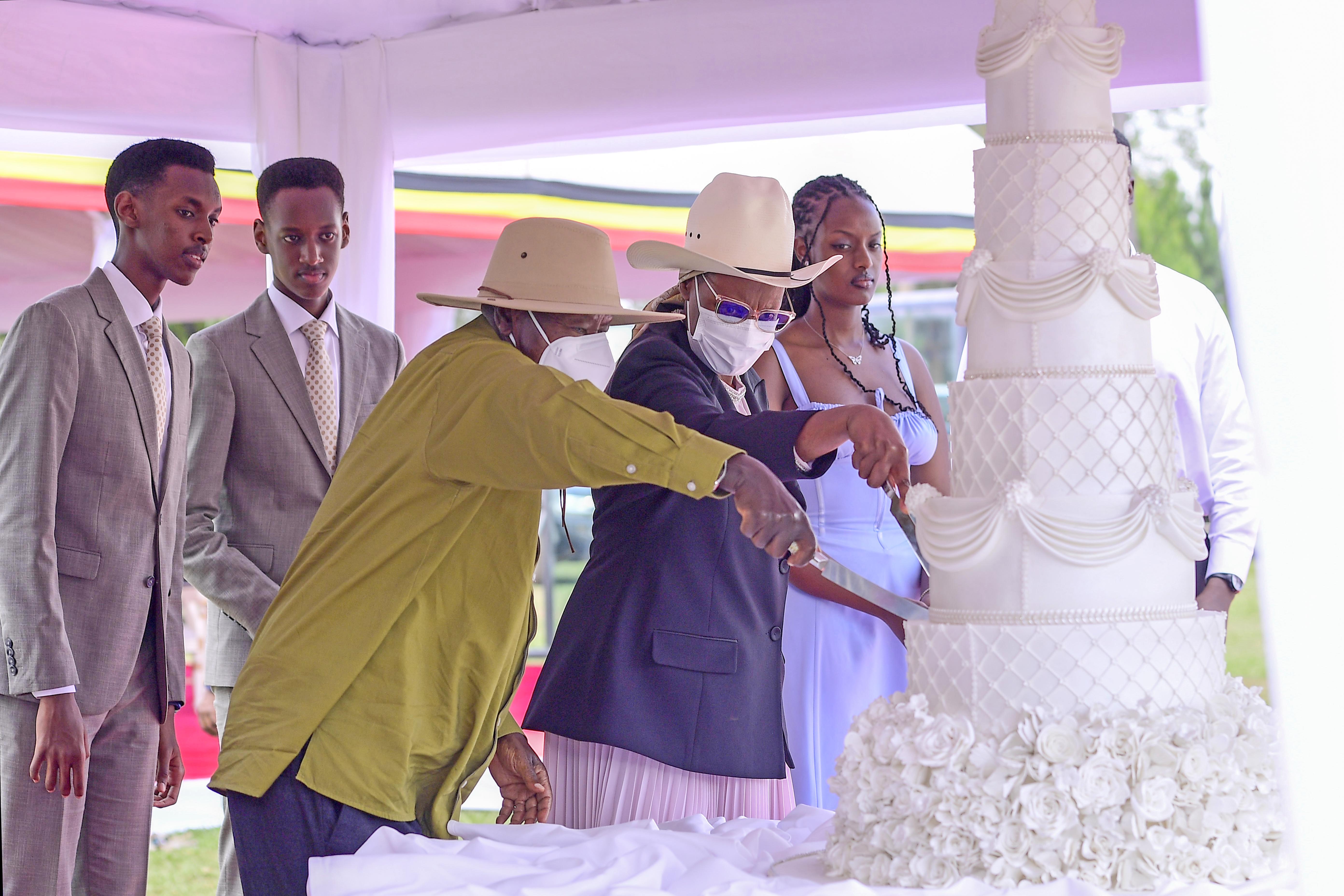 President Yoweri Museveni with the First Lady and Minister of Education and Sports, Mrs Janet Museveni cutting a cake to celebrate Museveni's 80th birthday as their grandchildren look on. This was at Kijaguzo in Nakaseke District on Sunday, September 15, 2024. 