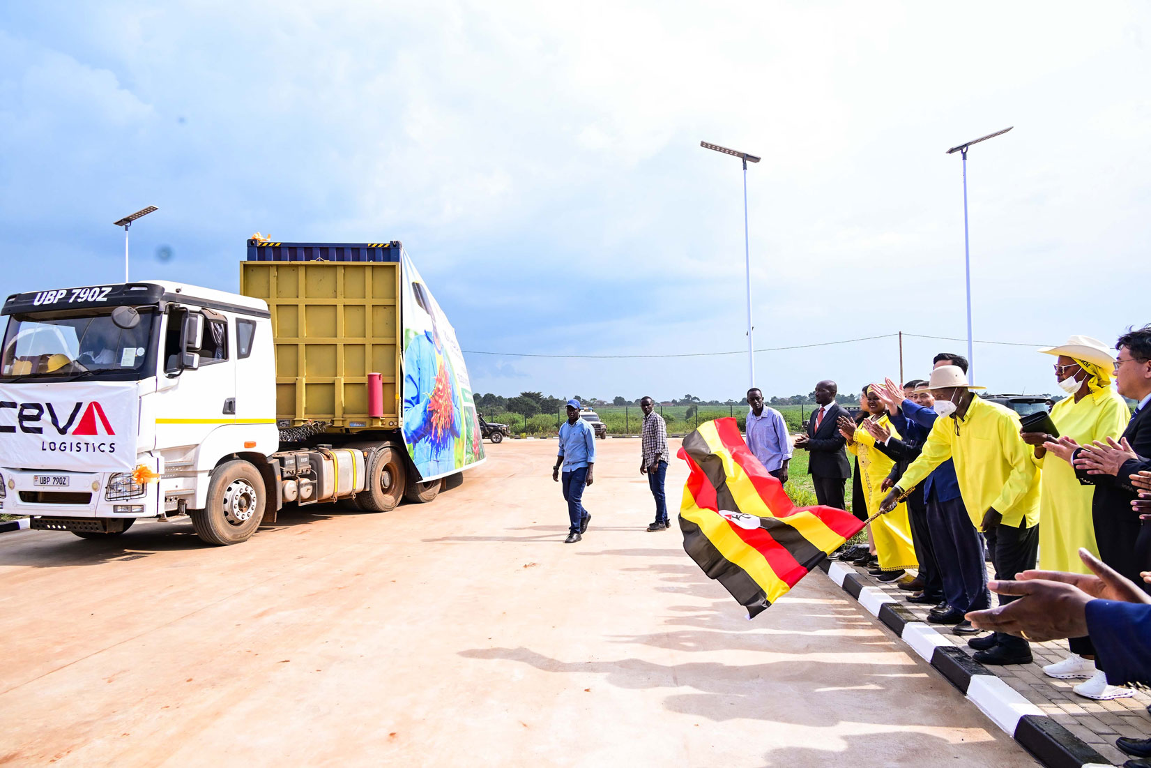 President-Museveni-accompanied-by-First-Lady-Janet-Museveni-flags-off-Uganda's-first-batch-of-chili-containers-to-the-Chinese-market-during-a-function-held-at-Namasagali-on-Thursday
