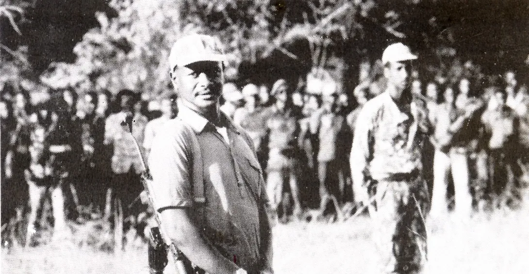 Yoweri museveni (left) and the commander of the elite mobile brigade of NRA Salim saleh Rufu, inspect troops in Luwero Triangle